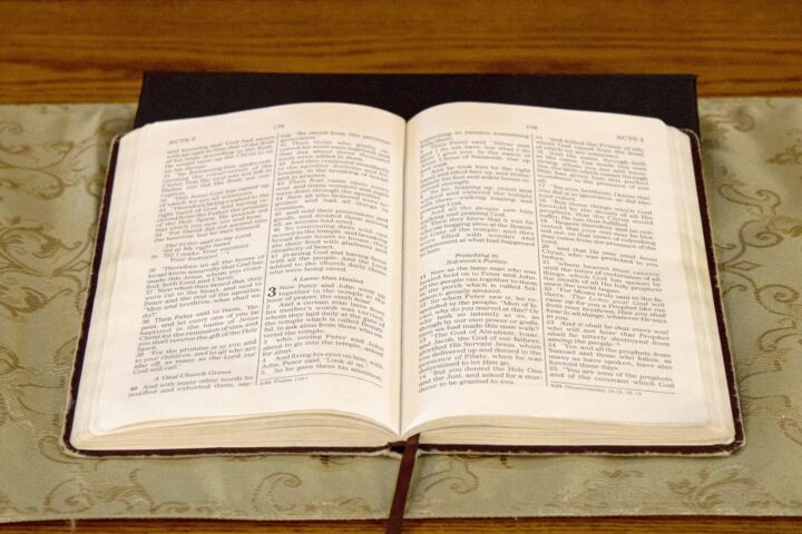 An open Bible on the communion table
